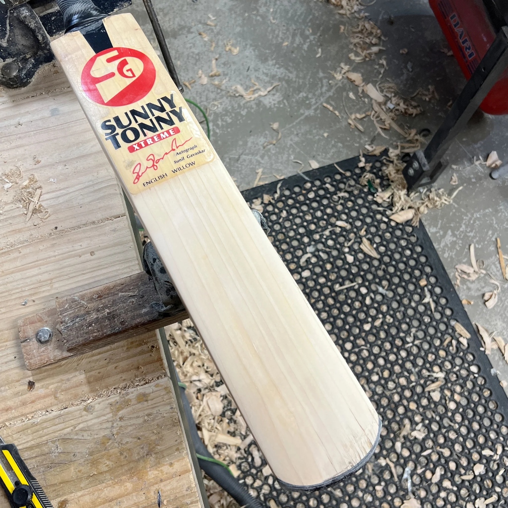 Cricket Bat Repair Workshop Background